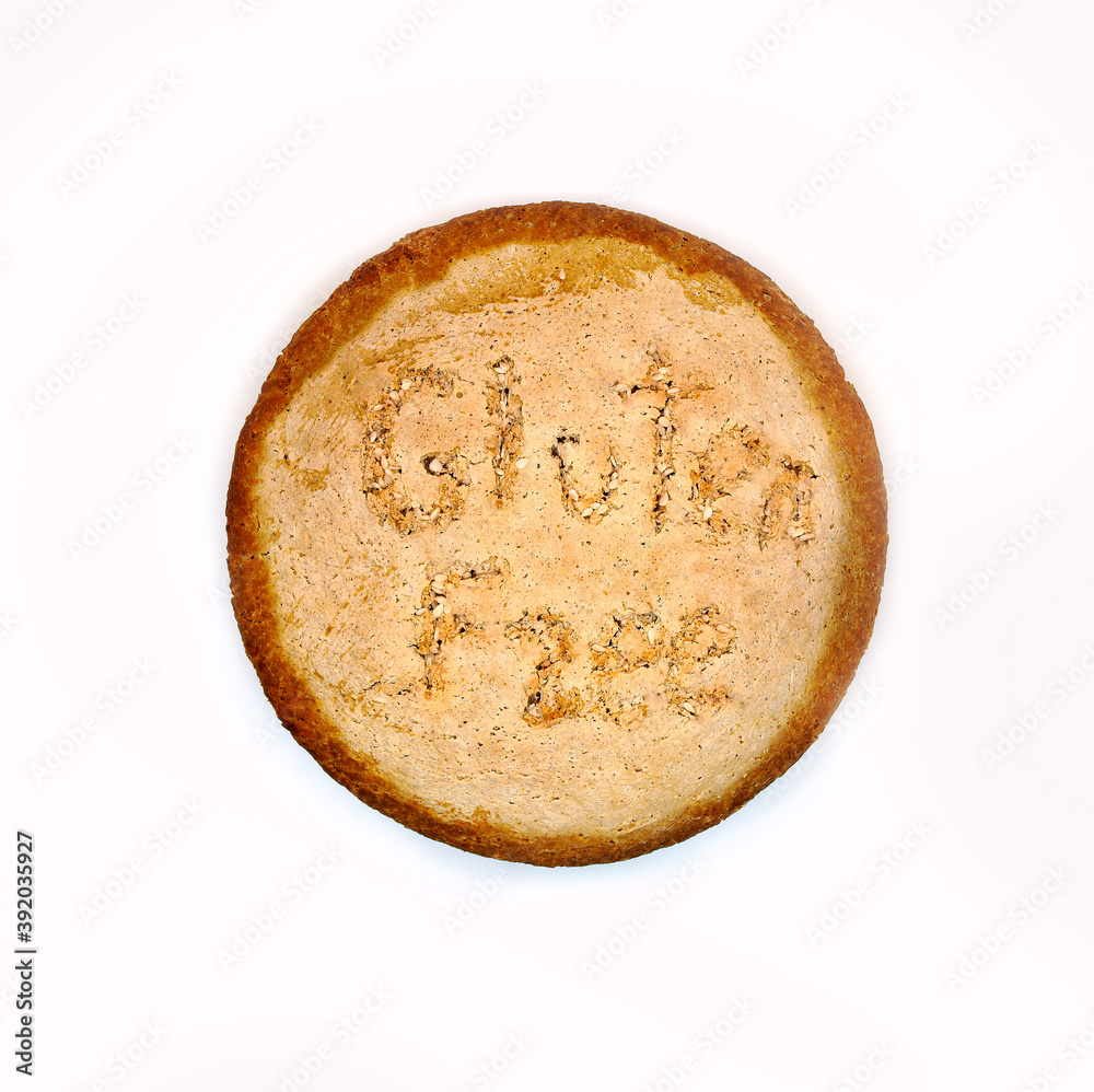 Gluten free round homemade bread isolated on white. Bread made from corn and tapioca starch, chickpeas, rice, corn flour. Bread with zero percent stencil Gluten free round homemade bread isolated on white. Bread made from corn and tapioca starch, chickpeas, rice, corn flour. Bread with zero percent stencil