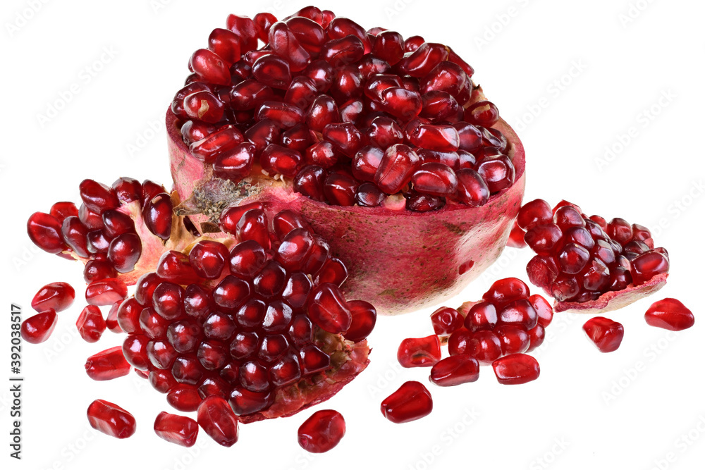 Cut the pomegranate with scattered grain isolated Cut the pomegranate with scattered grain isolated