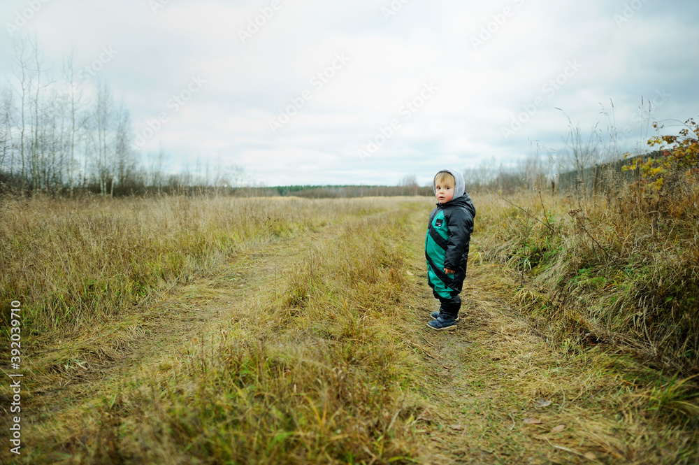 Baby boy in winter field Baby boy in winter field