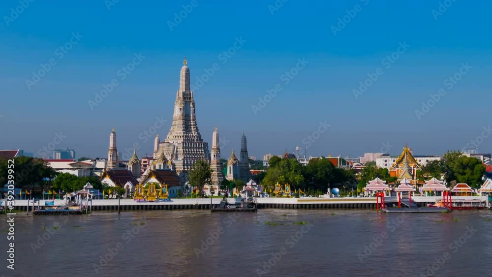 time lapse of Wat Arun Temple with Chao Phraya river in Bangkok, Thailand time lapse of Wat Arun Temple with Chao Phraya river in Bangkok, Thailand
