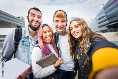 Group of cheerful multicutural students photo