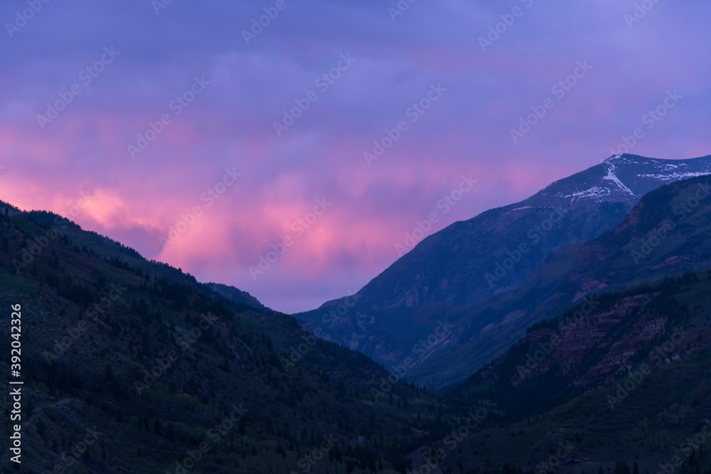 Idyllic shot of mountains against sky during sunset Idyllic shot of mountains against sky during sunset