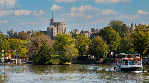Windsor, Berkshire, England, UK. 2020. A tourist passeneger boat on the River Thames at Windsor, Berkshire, UK.