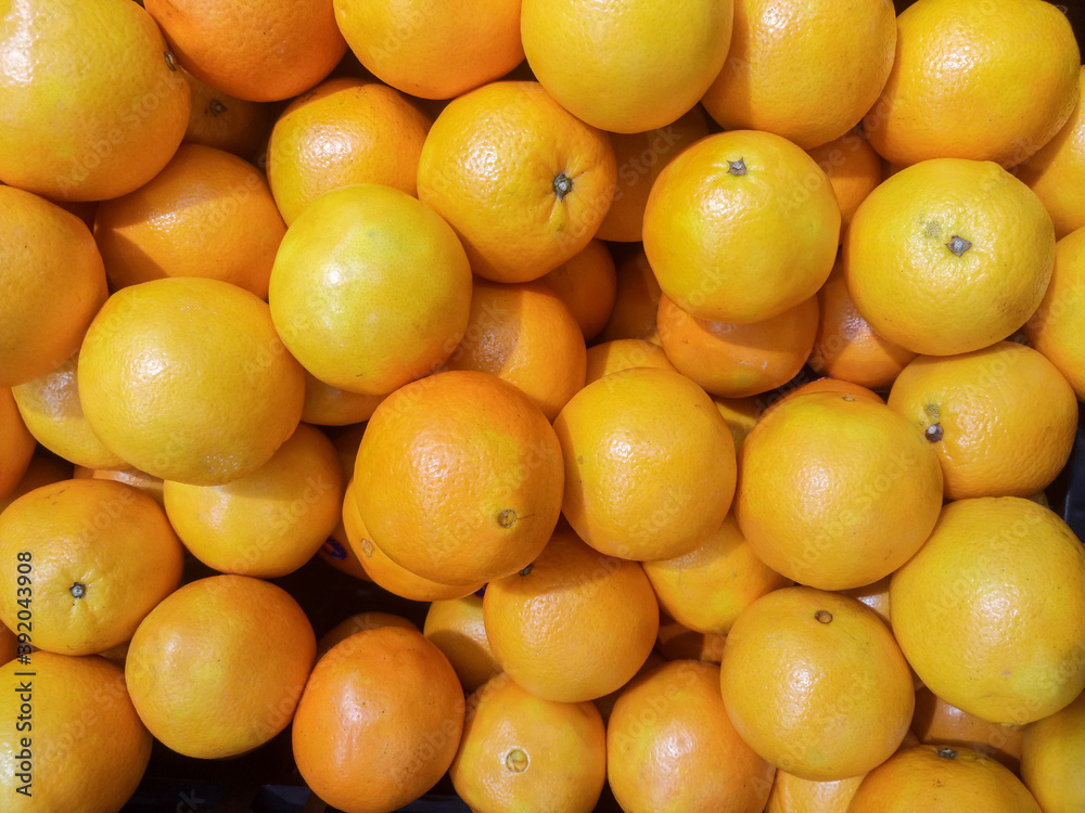 Mandarin oranges on the shelves in the supermarket. Mandarin oranges on the shelves in the supermarket.