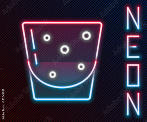 Glowing neon line Glass of rum icon isolated on black background. Colorful outline concept. Vector.