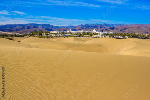 Sand Dunes in Gran Canaria with beautiful coast and beach at Maspalomas, Canarian Islands, Spain