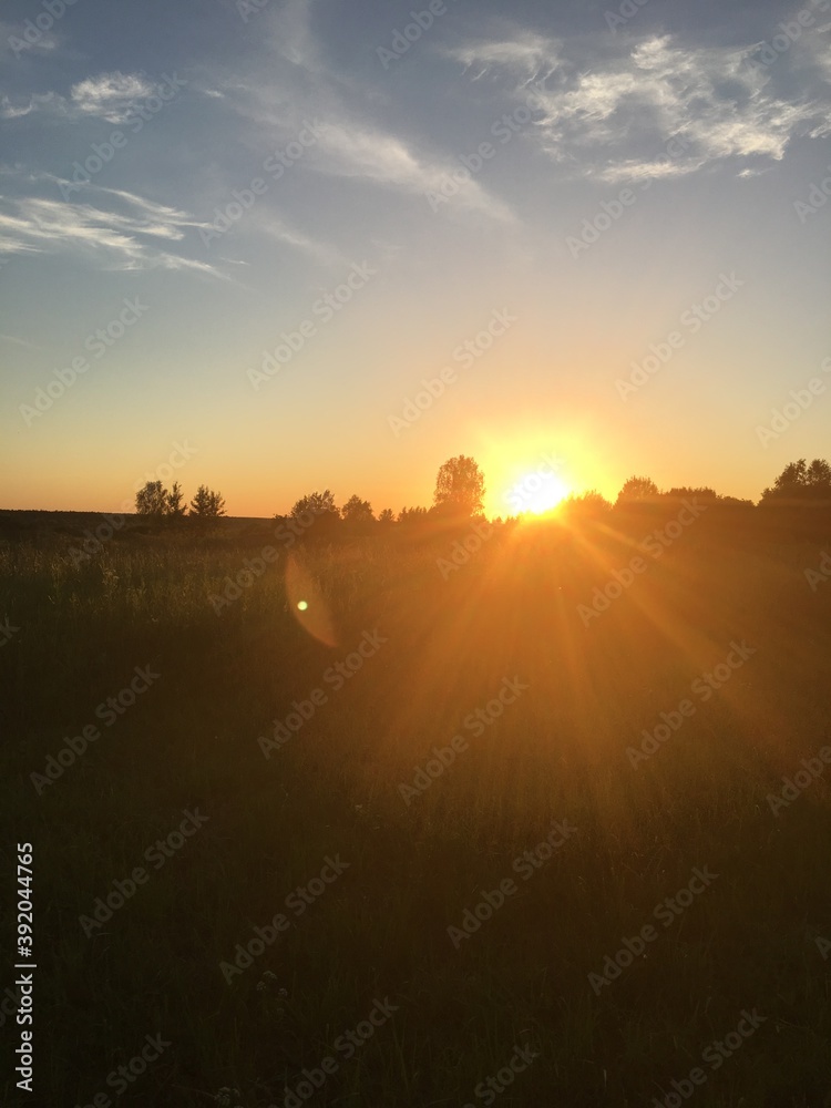 Obraz premium sunset over the river