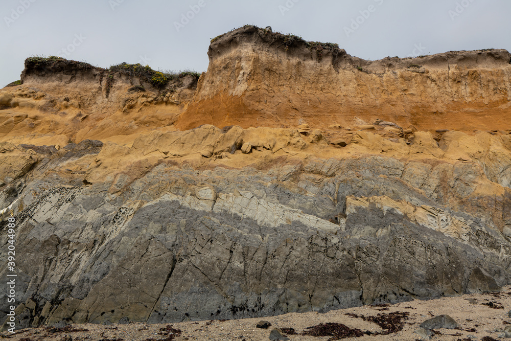 Seaside cliff showing different colors and textures in California Seaside cliff showing different colors and textures in California
