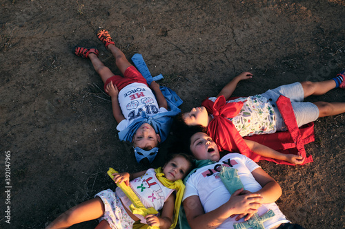 children disguised as superheroes pretend to be dead after the pitched