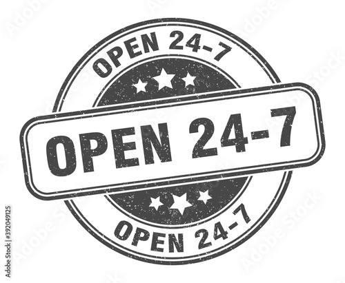 open 24 7 stamp. open 24 7 label. round grunge sign photo
