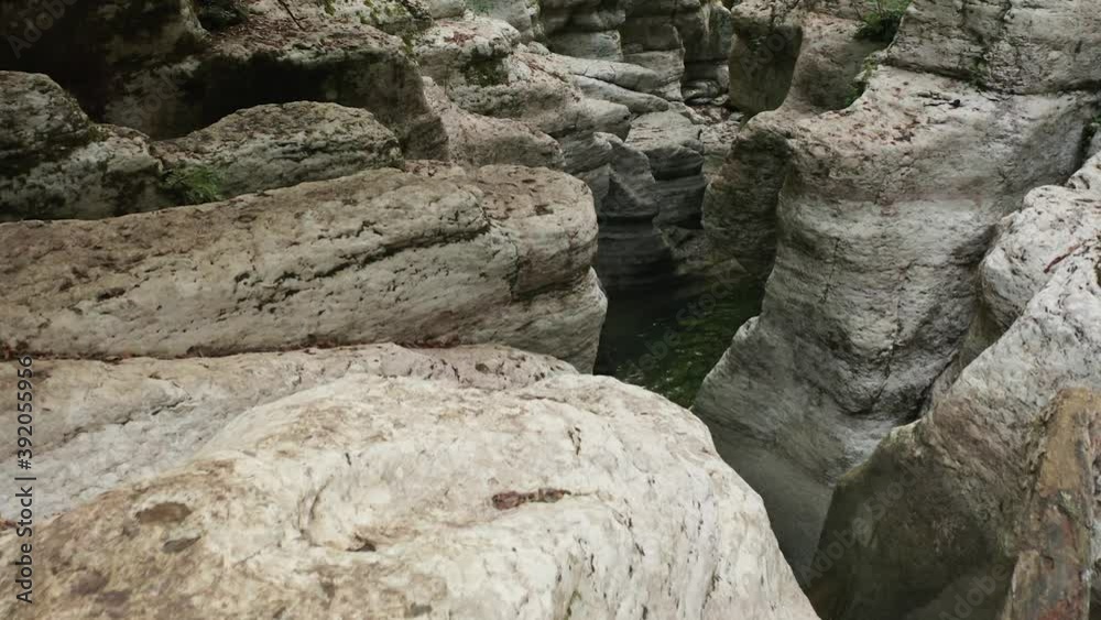 Mountain river among the rocks. Carpathian river in the forest. A river in the Sochi gorge. Mountain river among the rocks. Carpathian river in the forest. A river in the Sochi gorge.