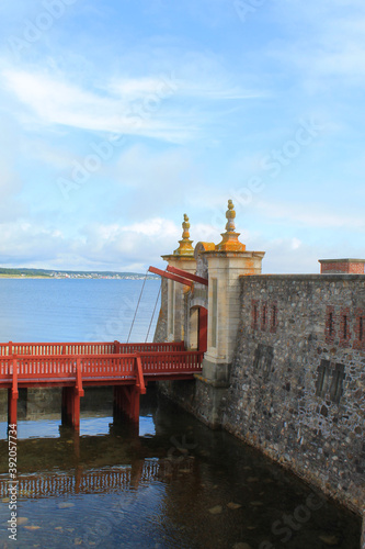 Red bridge and stone gate