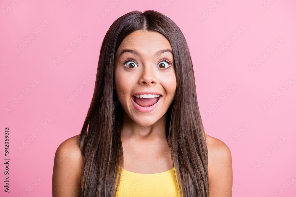 Fototapeta premium Photo portrait of excited screaming kid isolated on pastel pink colored background