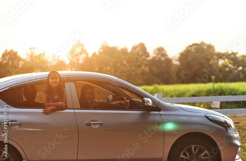 Woman and her children during the road trips