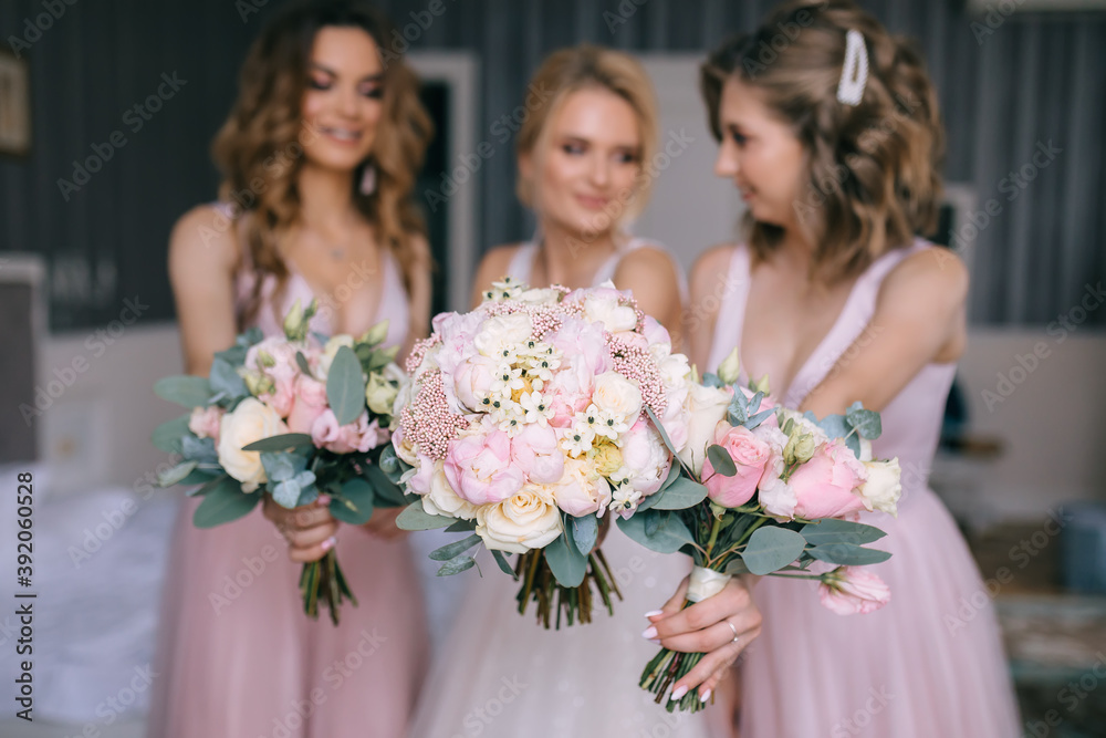girls reach out hands with wedding bouquets girls reach out hands with wedding bouquets