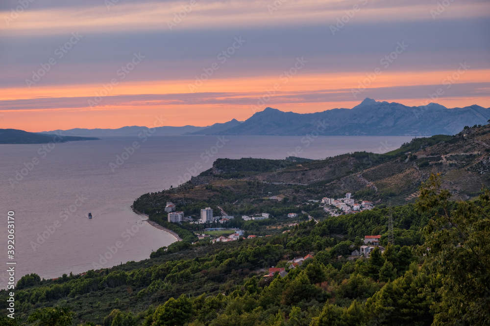 Sunset over Tucepi, Croatia. September 2020, panoramic top view Sunset over Tucepi, Croatia. September 2020, panoramic top view