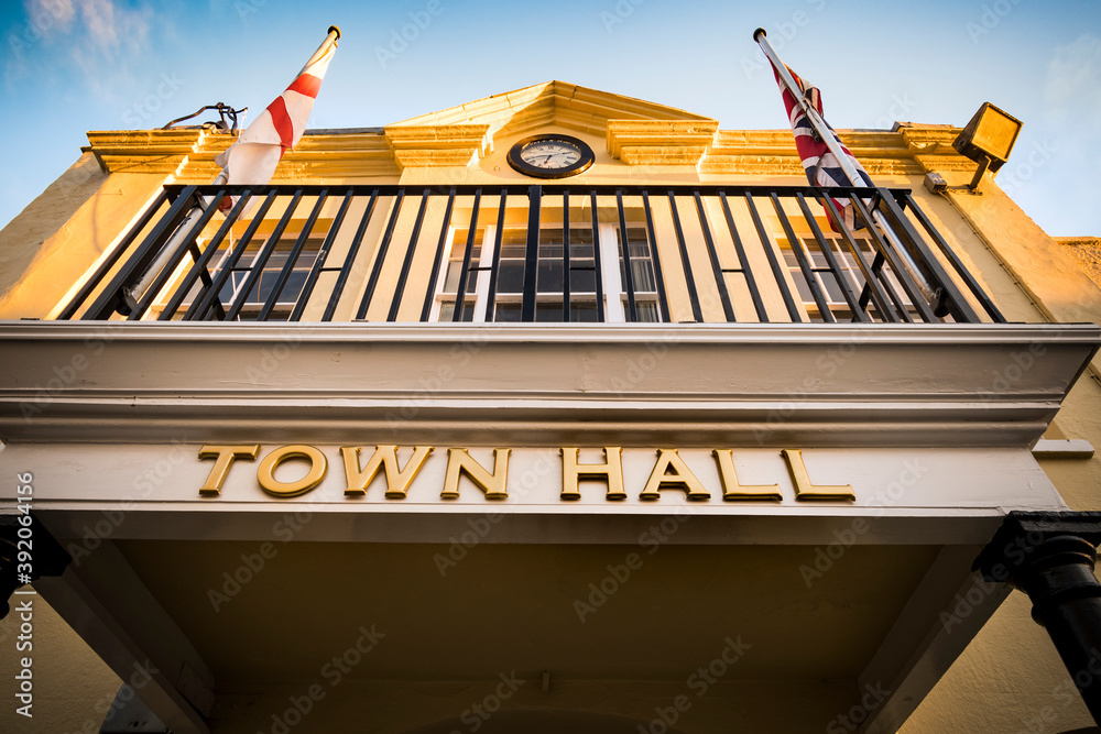 Looking up at town hall in early evening sunshine - obrazy, fototapety, plakaty 