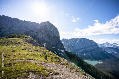Hiker Walking Along Sarrail Ridge During Sunset in Summer photo