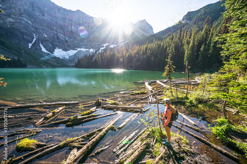 Hiker Watching The Sunset Over Rawson Lake Near Serrail Ridge photo