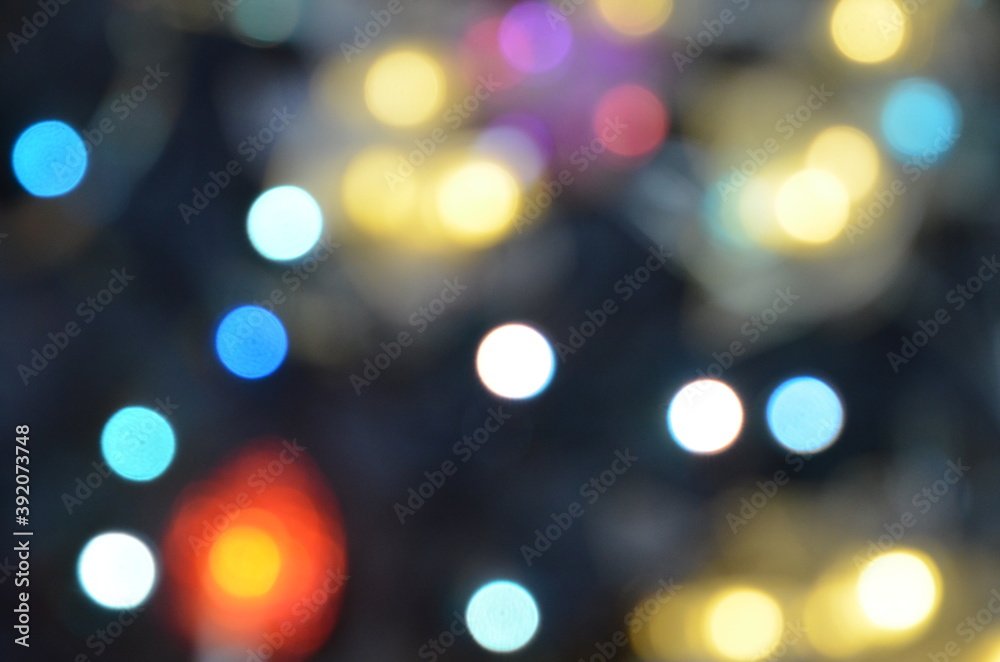 Red yellow blue and orange holiday bokeh. Abstract Christmas background new year background, no focus, blur, blurry