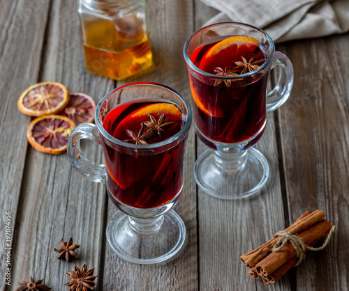 Mulled wine with cinnamon and orange. Hot drink. Winter. Recipe.