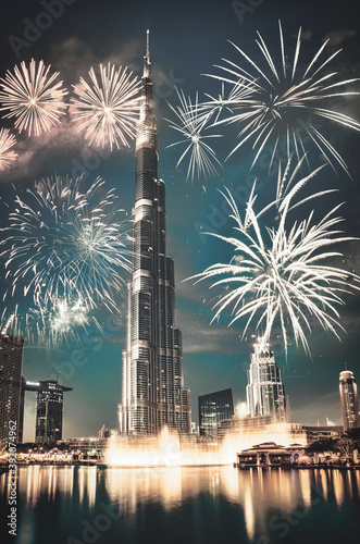 Fotografering fireworks around Burj Khalifa - exotic New Year destination, Dubai, UAE
