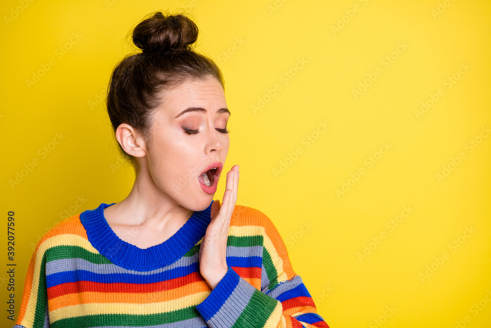 Photo of tired young woman yawn cover mouth hand closed eyes stand copyspace isolated on yellow color background Photo of tired young woman yawn cover mouth hand closed eyes stand copyspace isolated on yellow color background