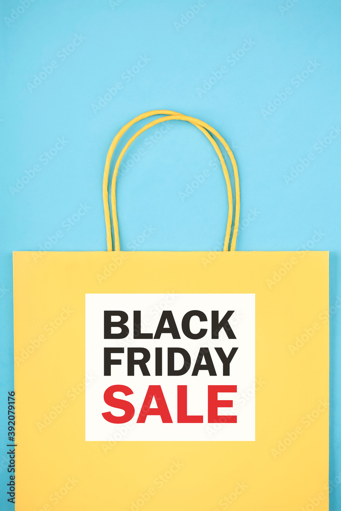 Black friday.Yellow shopping bag with text.Shopping concept Black friday.Yellow shopping bag with text.Shopping concept