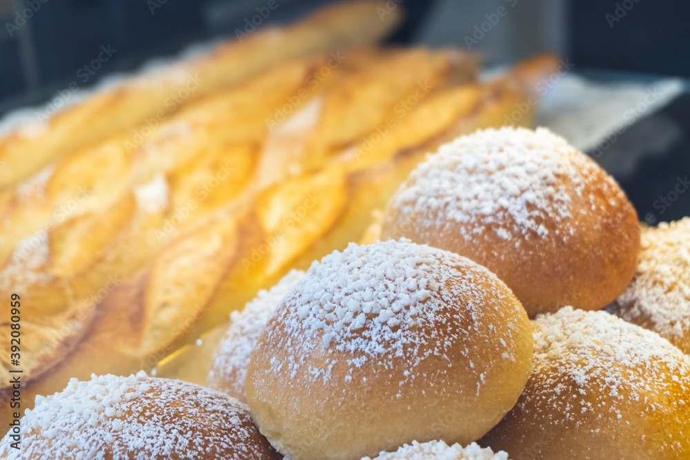 Close-up of sugar coated fluffy buns in bakery
