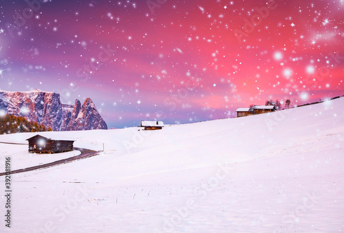 amazing winter landscape with snow at sunrise in Alpe di Siusi. Dolomites  Italy - winter holidays destination © Melinda Nagy
