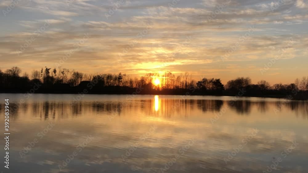 Sunset reflection in a lake around Zelhem, The Netherlands Sunset reflection in a lake around Zelhem, The Netherlands