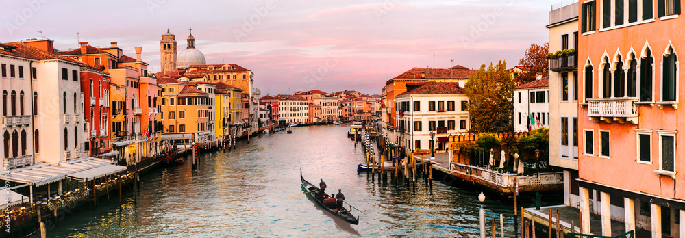 Romantic Venice town over sunset. View from bridge Skalzi for Grand canal. Italy travel and landmarks
