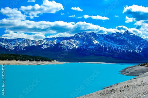 Sulpher blue waters at rest. Abraham Lake, Banff National Park, Alberta, Canada