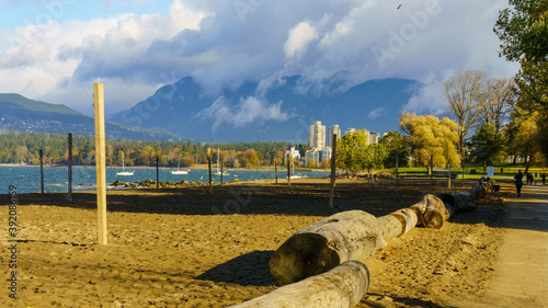 Картината върху платно Out for a brisk walk at a park beach stroll on a cloudy and blustery Autumn day