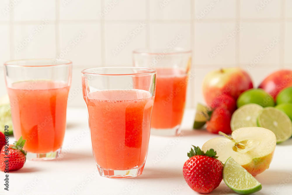 glass of strawberry smoothie glass of strawberry smoothie