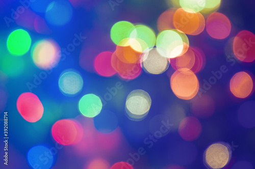 Blurred lights of glowing Christmas garland background