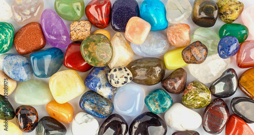 Multicolored background from mineral stones. Flat lay. Colorful abstract background. Close up.
