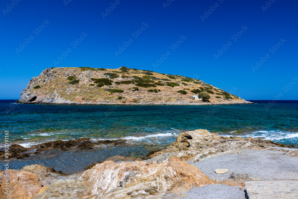 Small Greek fishing village and harbour with clear ocean Small Greek fishing village and harbour with clear ocean