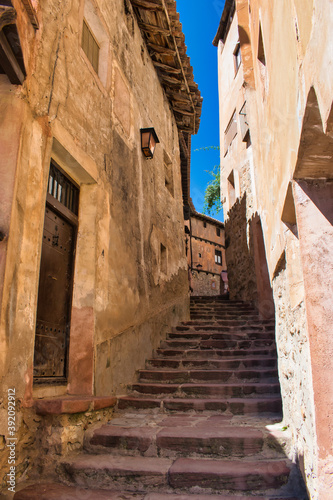 Narrow stepped street in the historic center of the medieval town of Albarracin, Teruel, Spain