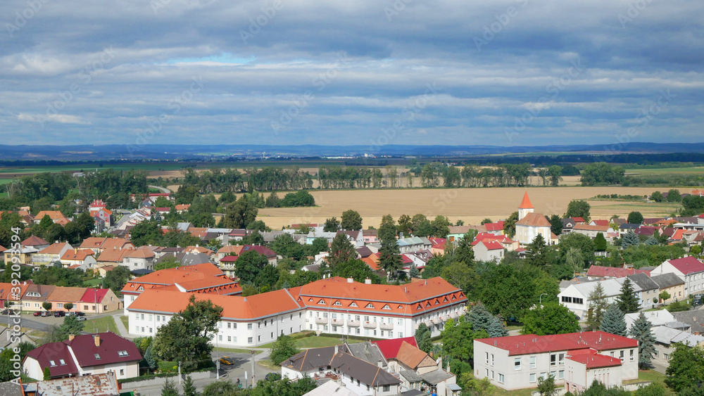 TOVACOV, CZECH REPUBLIC, SEPTEMBER 24, 2020: Town village Tovacov aerial panorama shot in the heart Hana of the culturally landscape of the village family houses and buildings fields wheat Czech