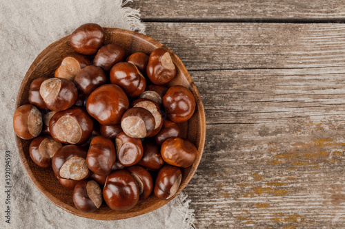 Chestnuts on an old wooden table