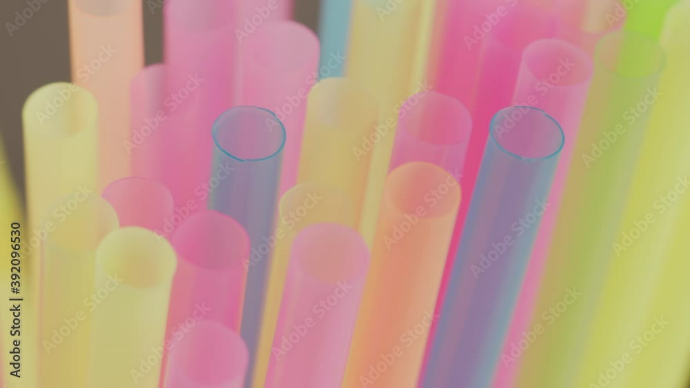 Plastic multicolored cocktail tubes, close up, camera movement, rack focus Plastic multicolored cocktail tubes, close up, camera movement, rack focus