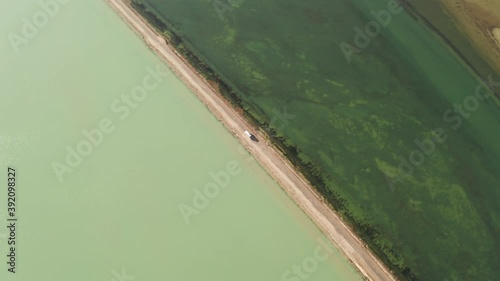 The lake with a path in the middle. photo