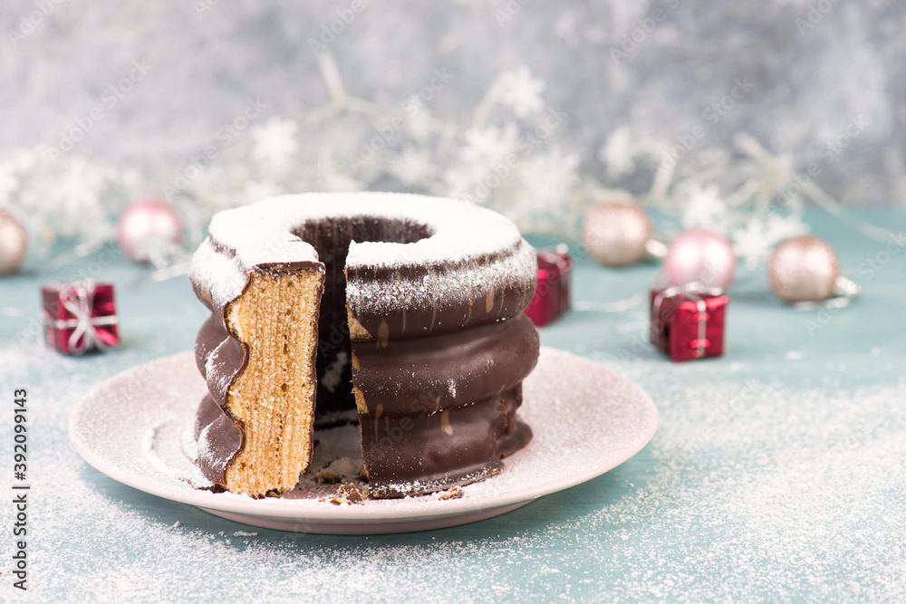 Traditional german christmas chocolate cake called Baumkuchen, winter