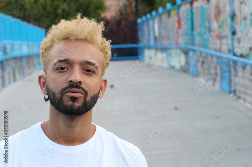 Handsome African American man with cool hairstyle 