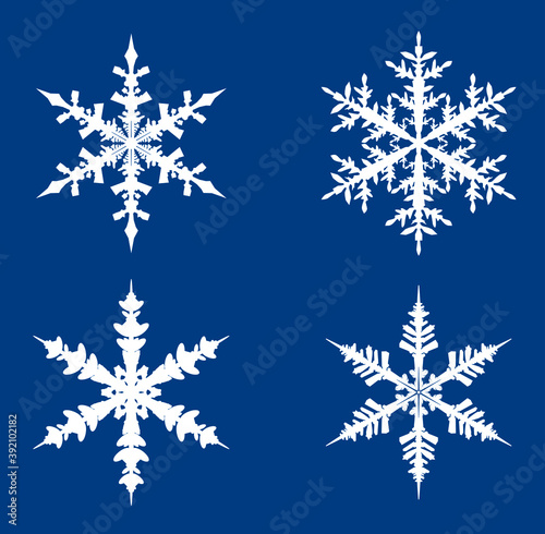 White isolated snowflake icons. Vector Illustration. Christmas decoration.