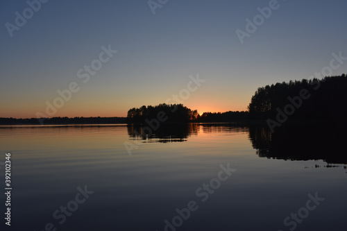red sunset on the lake © loginov_photo_
