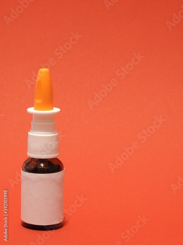 Large unnamed nasal spray on red background