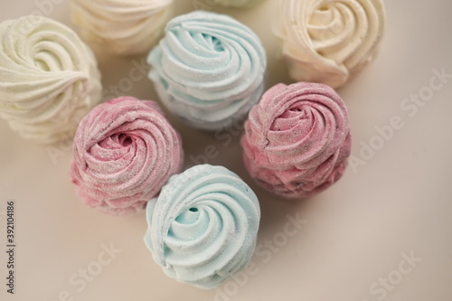hand-made colored marshmallows on the surface. the special focus. place for text. confectionery