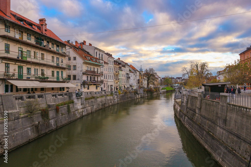 Ljubljana/ Slovenia-October 11th, 2018: Magnificent, colorful houses towering above Ljubljanica river canal in the city center © Miroslav Posavec